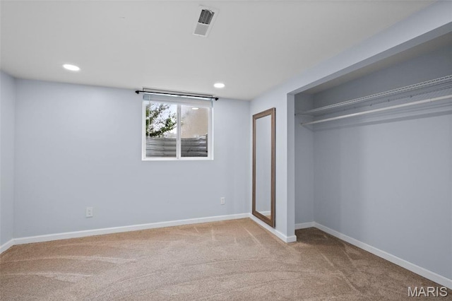 2231 Central Park Dr, Troy, MO 63379 - unfurnished bedroom featuring carpet, baseboards, recessed lighting, and a closet