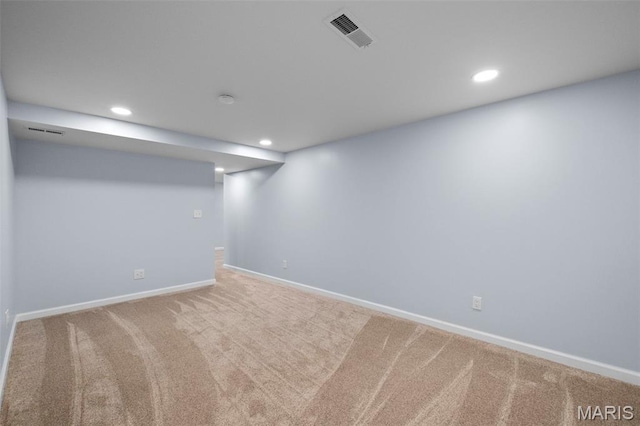 2231 Central Park Dr, Troy, MO 63379 - finished below grade area with carpet, baseboards, and recessed lighting