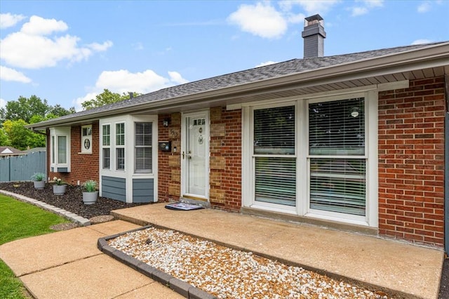9513 Sequoia Ct, Affton, MO 63123 - doorway to property with brick siding and a chimney