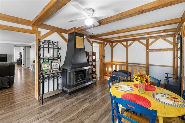9513 Sequoia Ct, Affton, MO 63123 - dining room featuring ceiling fan, beam ceiling, and wood finished floors