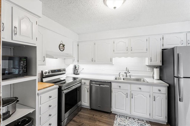 9513 Sequoia Ct, Affton, MO 63123 - kitchen featuring stainless steel appliances, a sink, white cabinetry, a textured ceiling, and light countertops