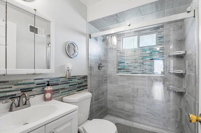 9513 Sequoia Ct, Affton, MO 63123 - full bath with toilet, a shower stall, vanity, and tile walls