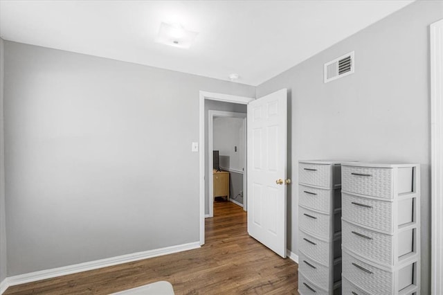 9513 Sequoia Ct, Affton, MO 63123 - unfurnished bedroom with wood finished floors and baseboards