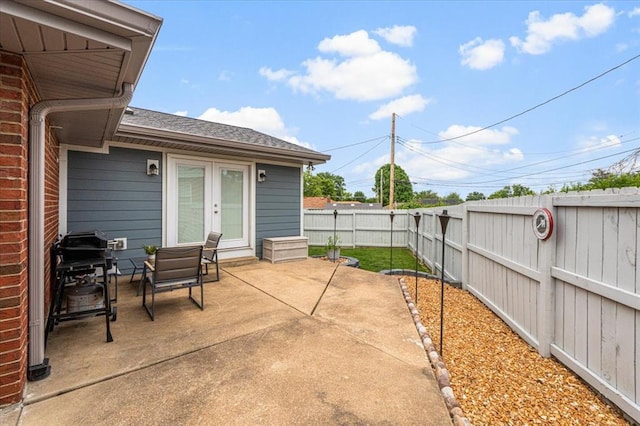 9513 Sequoia Ct, Affton, MO 63123 - fenced backyard featuring a patio, french doors, and area for grilling