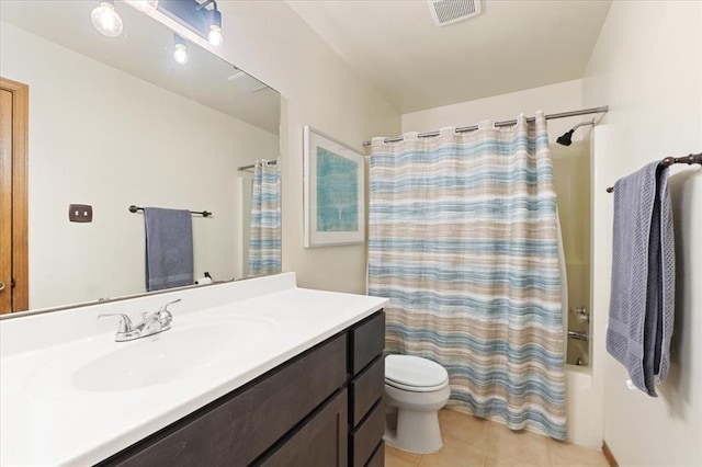 2032 New Sun Dr, Florissant, MO 63031 - bathroom featuring tile patterned flooring, toilet, vanity, and shower / tub combo with curtain