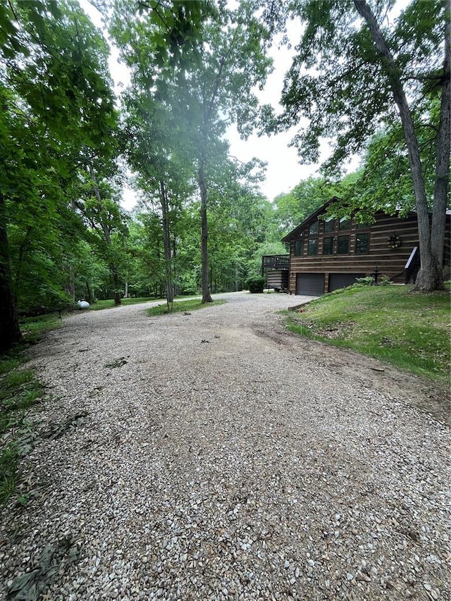 16453 Scenic Ridge Rd, Marthasville, MO 63357 - view of yard with a garage and driveway