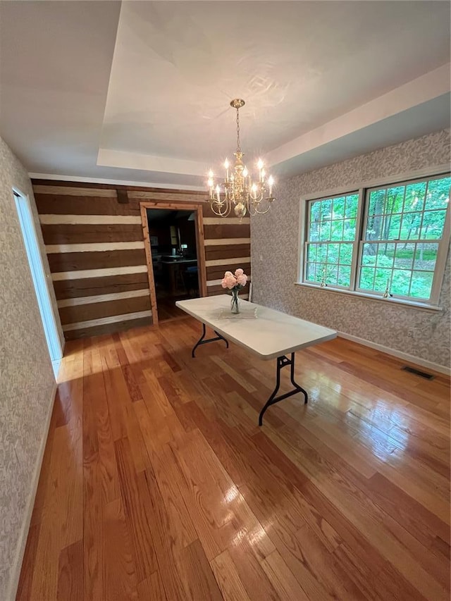 16453 Scenic Ridge Rd, Marthasville, MO 63357 - unfurnished dining area with hardwood / wood-style floors and a chandelier