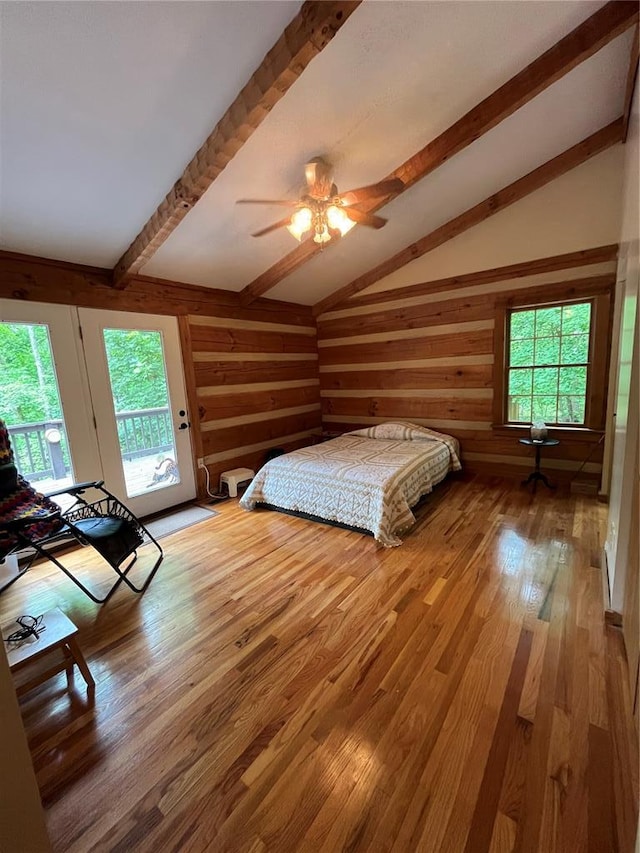 16453 Scenic Ridge Rd, Marthasville, MO 63357 - bedroom with access to exterior, wood finished floors, wood walls, and ceiling fan