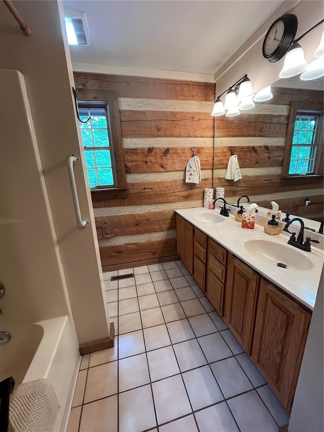 16453 Scenic Ridge Rd, Marthasville, MO 63357 - full bath with wood walls, double vanity, tile patterned flooring, and  shower combination