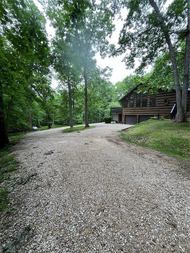 16453 Scenic Ridge Rd, Marthasville, MO 63357 - view of yard with an attached garage and driveway