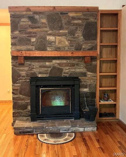 16453 Scenic Ridge Rd, Marthasville, MO 63357 - detailed view of a stone fireplace and wood finished floors