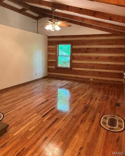 16453 Scenic Ridge Rd, Marthasville, MO 63357 - empty room with a ceiling fan, wooden walls, and wood finished floors