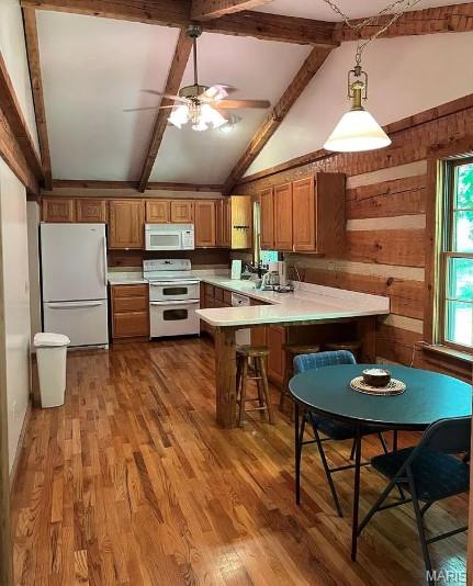 16453 Scenic Ridge Rd, Marthasville, MO 63357 - kitchen with white appliances, light countertops, a ceiling fan, a peninsula, and wood finished floors