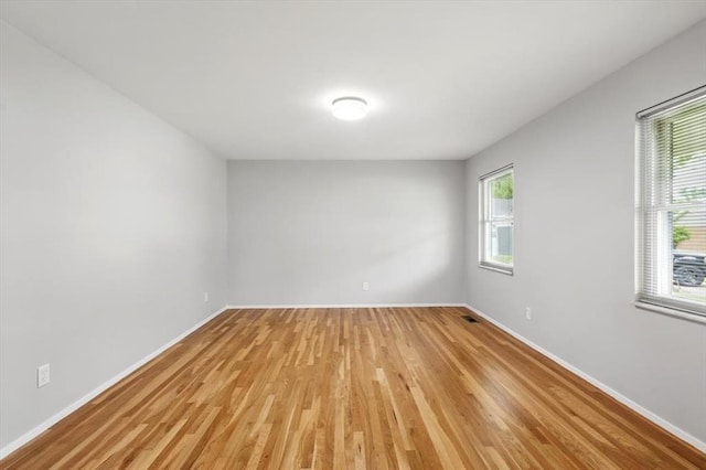 13105 Dartagnan Ct, Creve Coeur, MO 63141 - spare room featuring light wood-type flooring and baseboards
