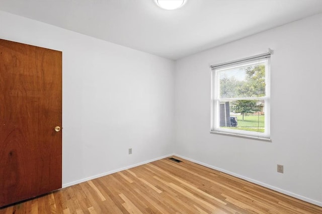 13105 Dartagnan Ct, Creve Coeur, MO 63141 - spare room featuring light wood finished floors and baseboards