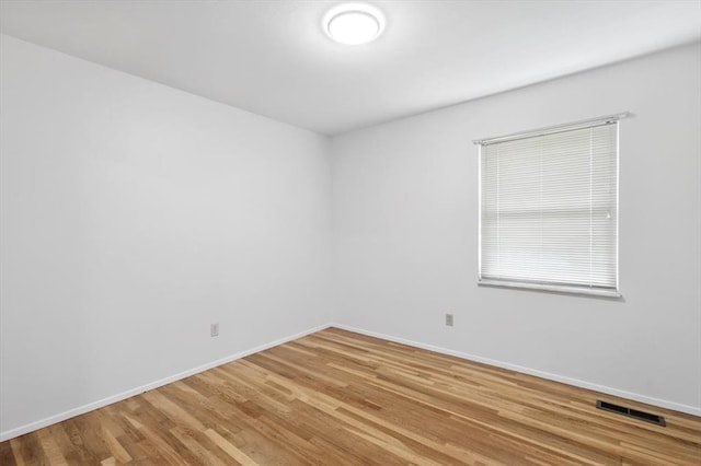 13105 Dartagnan Ct, Creve Coeur, MO 63141 - unfurnished room with baseboards and wood finished floors