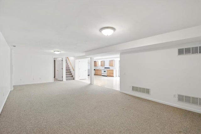 13105 Dartagnan Ct, Creve Coeur, MO 63141 - finished below grade area with stairway, baseboards, and carpet flooring