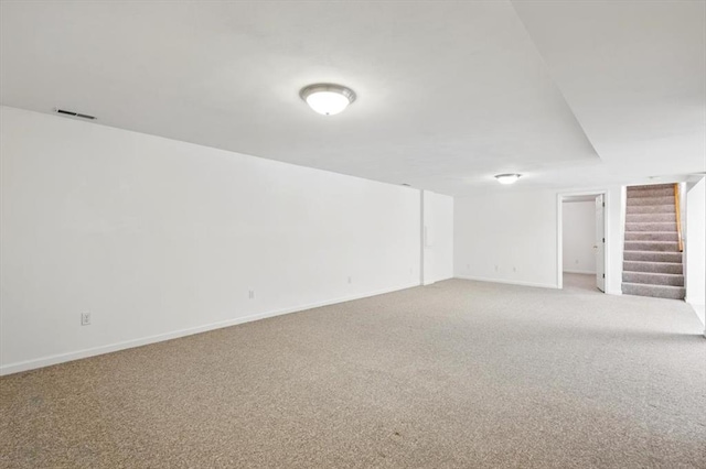 13105 Dartagnan Ct, Creve Coeur, MO 63141 - spare room featuring stairway, light colored carpet, and baseboards
