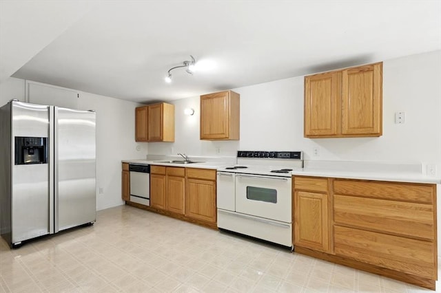 13105 Dartagnan Ct, Creve Coeur, MO 63141 - kitchen featuring white appliances, a sink, light countertops, and light flooring