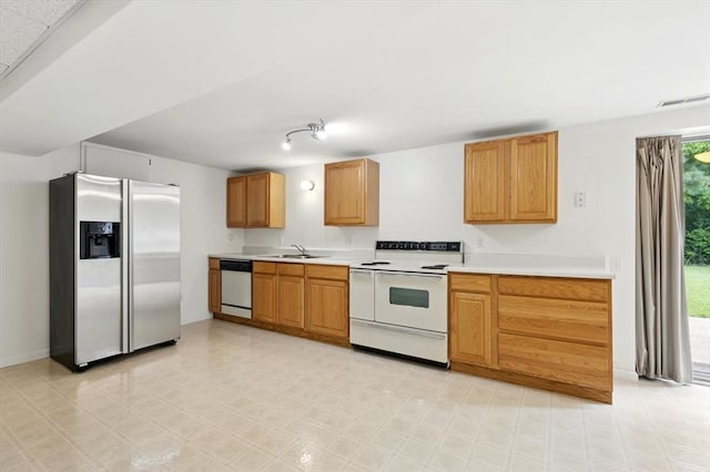 13105 Dartagnan Ct, Creve Coeur, MO 63141 - kitchen with white appliances, light countertops, and a sink
