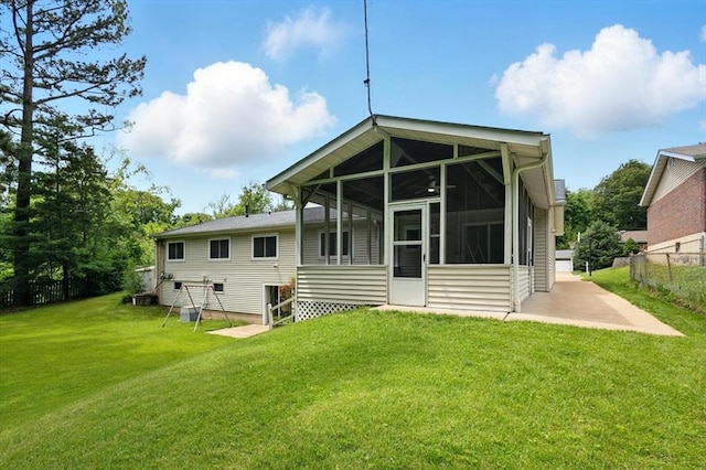 13105 Dartagnan Ct, Creve Coeur, MO 63141 - rear view of house with a sunroom and a patio