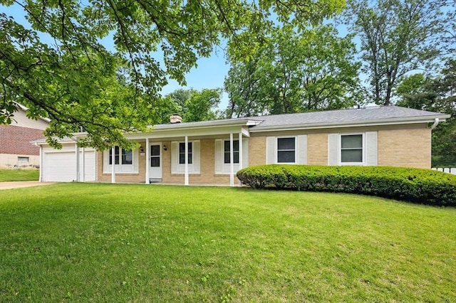 13105 Dartagnan Ct, Creve Coeur, MO 63141 - ranch-style home with a front yard, a garage, brick siding, driveway, and covered porch