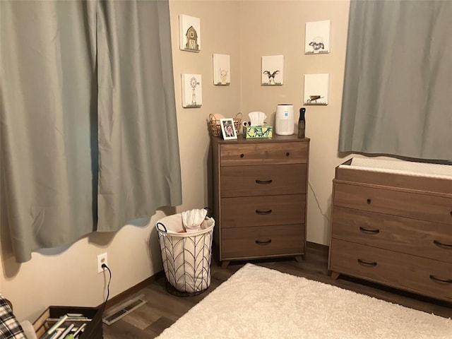 21734 Keyesport Rd, Carlyle, IL 62253 - bedroom featuring dark wood-type flooring and baseboards