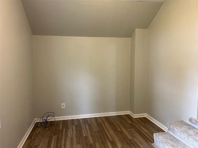 1910 E B St E, Belleville, IL 62221 - bonus room featuring dark wood-style floors, baseboards, and vaulted ceiling