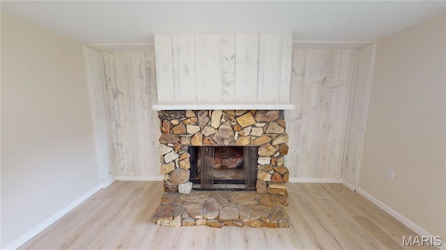 1350 Norwood Dr, Granite City, IL 62040 - detailed view of wood finished floors and a stone fireplace