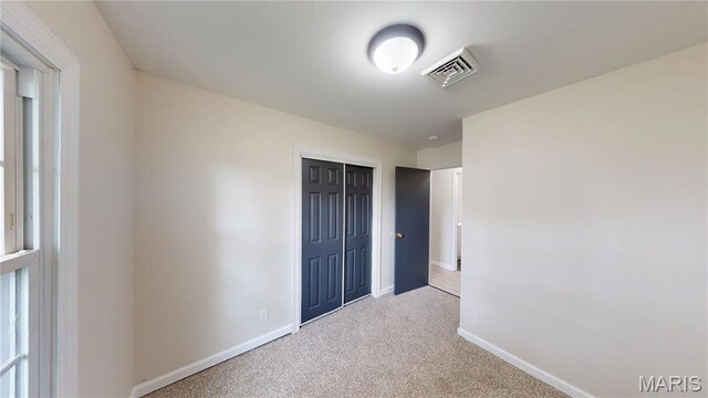 1350 Norwood Dr, Granite City, IL 62040 - unfurnished bedroom featuring carpet floors and a closet