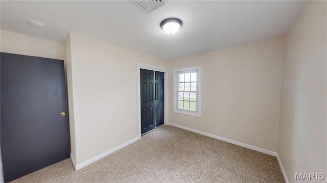 1350 Norwood Dr, Granite City, IL 62040 - unfurnished bedroom featuring carpet floors and a closet