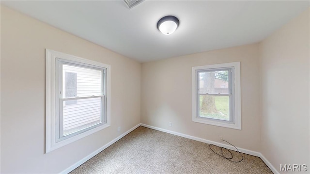 1350 Norwood Dr, Granite City, IL 62040 - unfurnished room featuring light colored carpet and baseboards