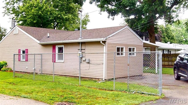 1350 Norwood Dr, Granite City, IL 62040 - view of side of home with a chimney and roof with shingles