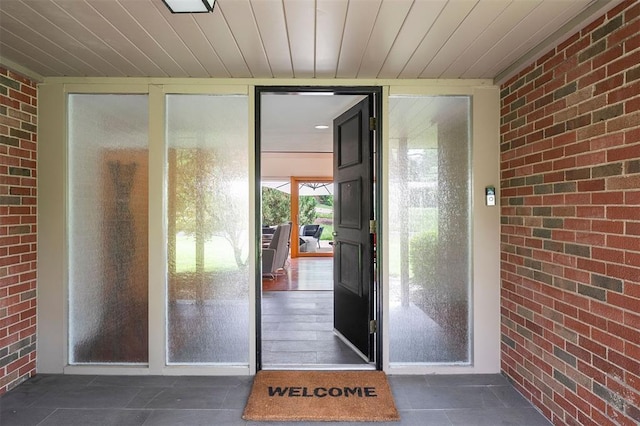36 Stoneyside Ln, Olivette, MO 63132 - doorway to property with brick siding