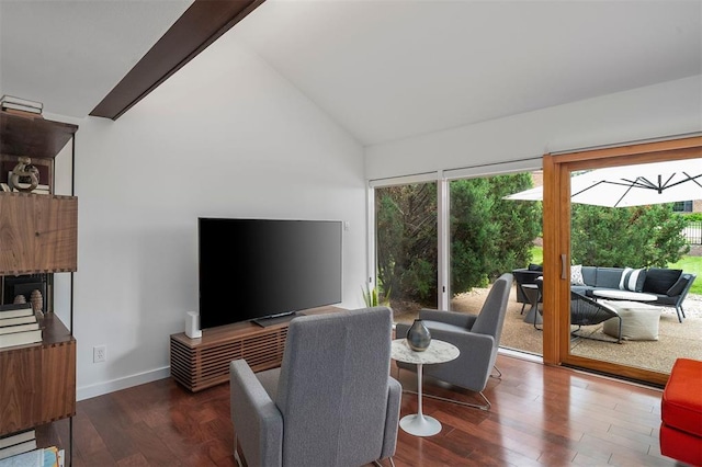 36 Stoneyside Ln, Olivette, MO 63132 - living area featuring vaulted ceiling, wood finished floors, and baseboards