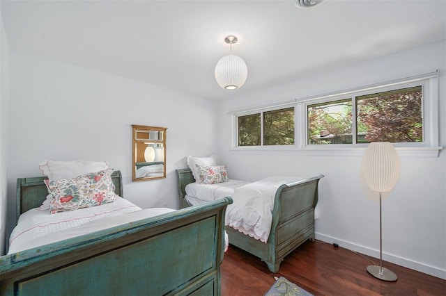 36 Stoneyside Ln, Olivette, MO 63132 - bedroom with dark wood-style flooring and baseboards