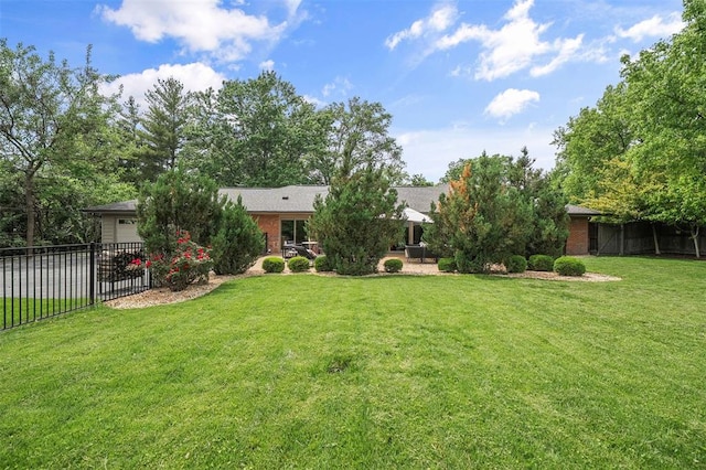 36 Stoneyside Ln, Olivette, MO 63132 - view of yard featuring an attached garage