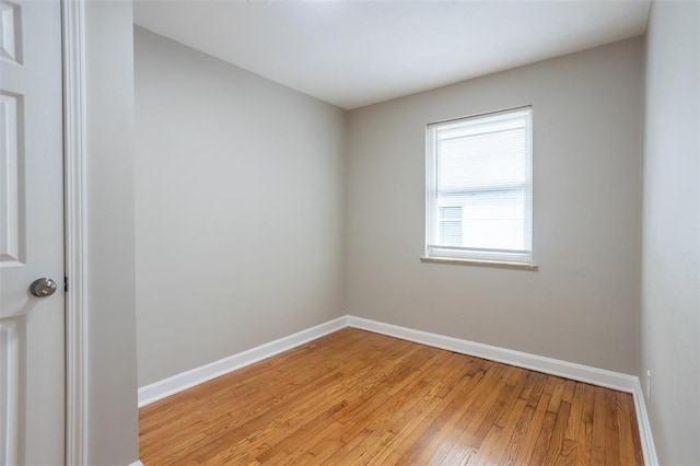3210 Capehart Dr, Saint Louis, MO 63121 - spare room with light wood-style flooring and baseboards
