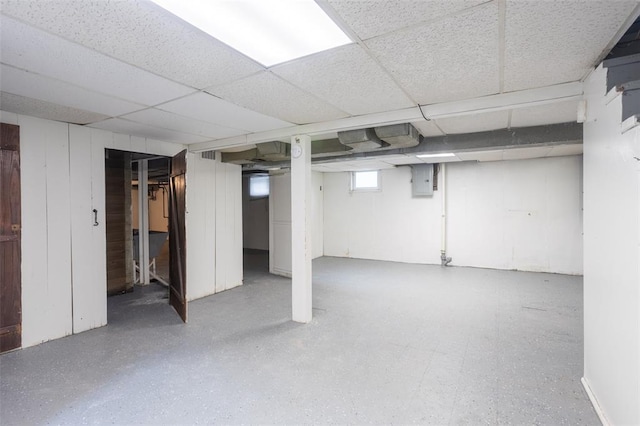 3210 Capehart Dr, Saint Louis, MO 63121 - below grade area featuring a paneled ceiling and electric panel