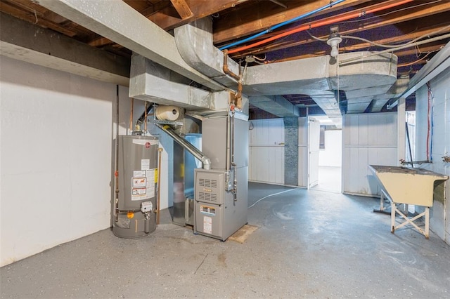 3210 Capehart Dr, Saint Louis, MO 63121 - unfinished below grade area featuring water heater, heating unit, and a sink