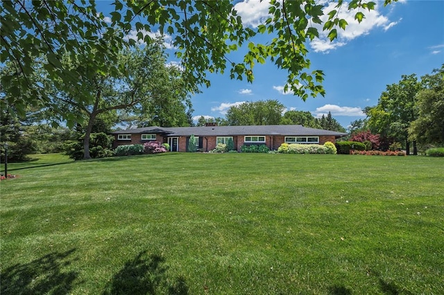 23 Vouga Ln, Frontenac, MO 63131 - single story home featuring brick siding and a front lawn