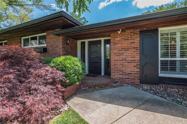 23 Vouga Ln, Frontenac, MO 63131 - entrance to property featuring brick siding