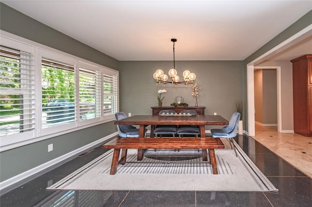 23 Vouga Ln, Frontenac, MO 63131 - dining room with a chandelier and baseboards