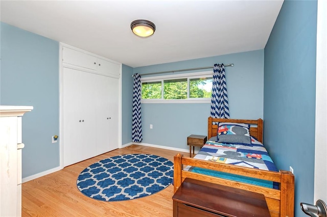 23 Vouga Ln, Frontenac, MO 63131 - bedroom with wood finished floors and baseboards