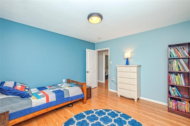 23 Vouga Ln, Frontenac, MO 63131 - bedroom with wood finished floors and baseboards
