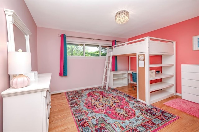 23 Vouga Ln, Frontenac, MO 63131 - bedroom with light wood-style flooring and baseboards