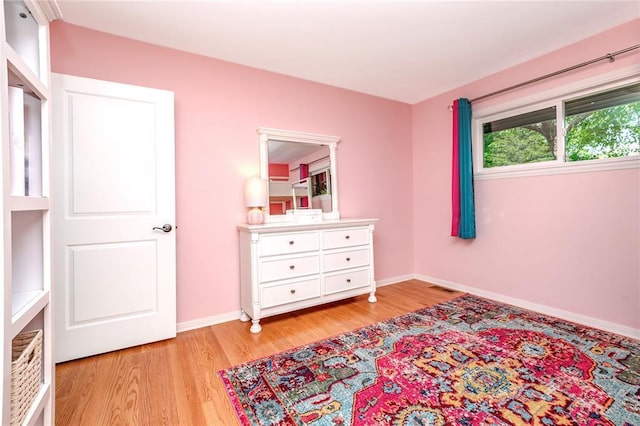 23 Vouga Ln, Frontenac, MO 63131 - bedroom with light wood finished floors and baseboards