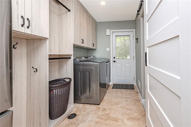 23 Vouga Ln, Frontenac, MO 63131 - laundry area featuring independent washer and dryer and cabinet space