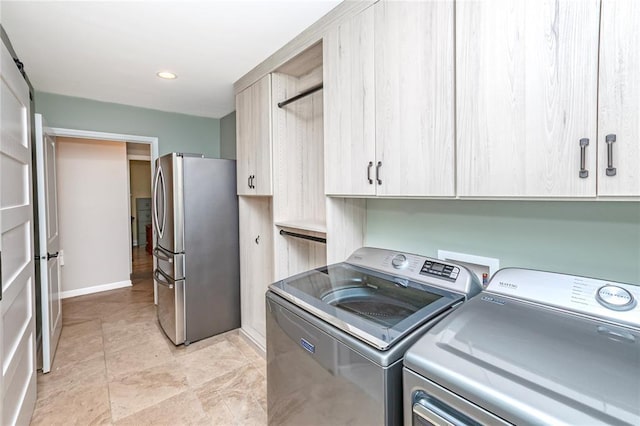 23 Vouga Ln, Frontenac, MO 63131 - laundry room with cabinet space, washer and clothes dryer, recessed lighting, and baseboards