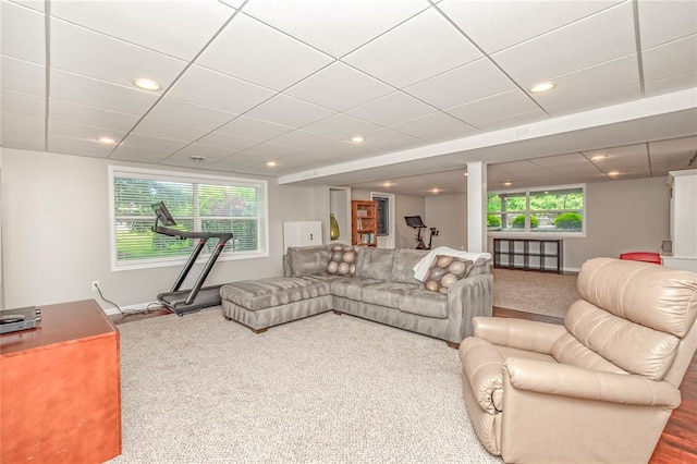 23 Vouga Ln, Frontenac, MO 63131 - carpeted living room featuring plenty of natural light, baseboards, and recessed lighting